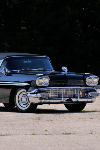 Das 1958 Pontiac Chieftain Wallpaper 320x480