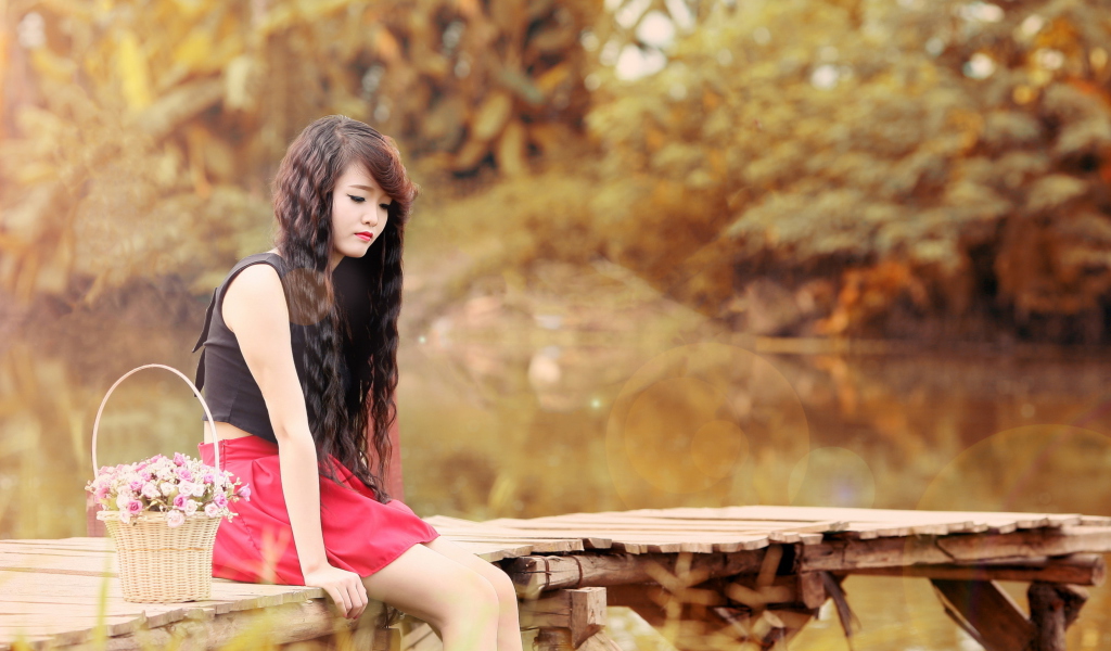 Fondo de pantalla Sad Asian Girl With Flower Basket 1024x600