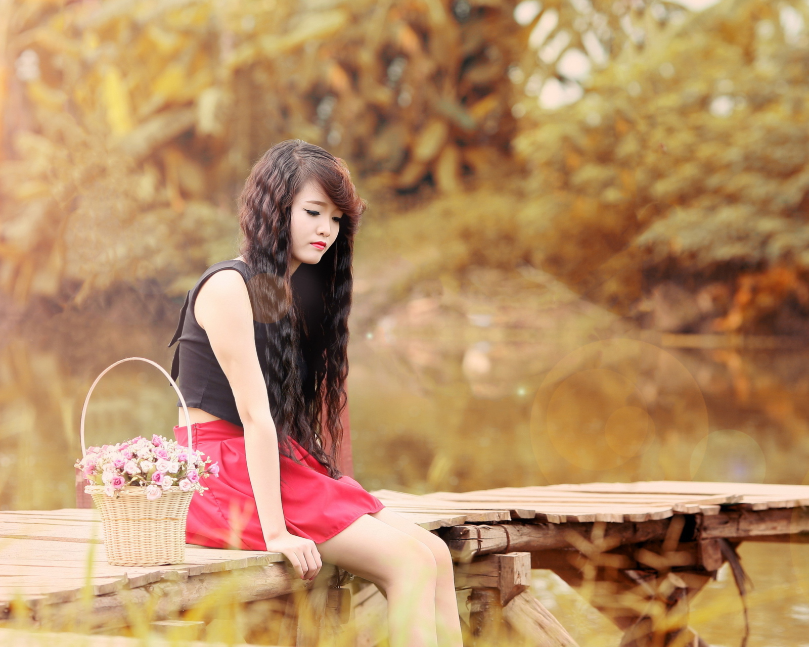 Sad Asian Girl With Flower Basket wallpaper 1600x1280