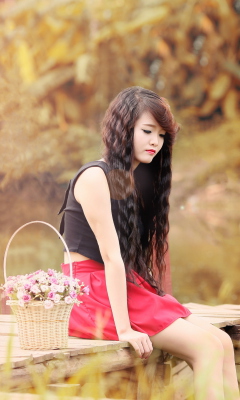 Sad Asian Girl With Flower Basket wallpaper 240x400