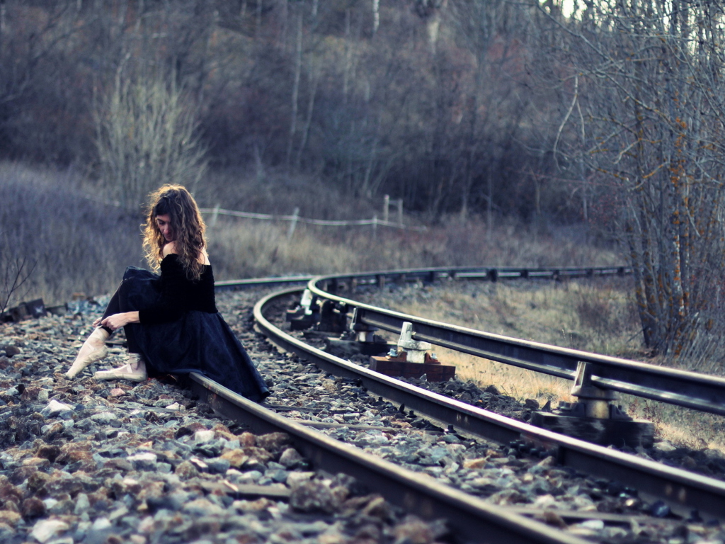 Girl In Black Dress Sitting On Railways wallpaper 1024x768