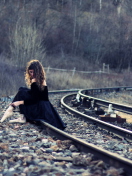 Sfondi Girl In Black Dress Sitting On Railways 132x176