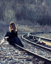 Fondo de pantalla Girl In Black Dress Sitting On Railways 176x220