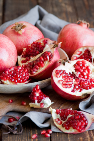 Обои Fresh Pomegranates 320x480