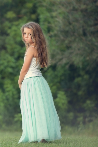 Sfondi Pretty Child In Long Blue Skirt 320x480