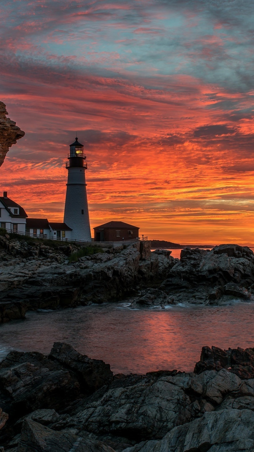 Обои Sunset and lighthouse 1080x1920