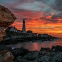 Sunset and lighthouse wallpaper 128x128