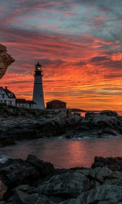 Fondo de pantalla Sunset and lighthouse 240x400