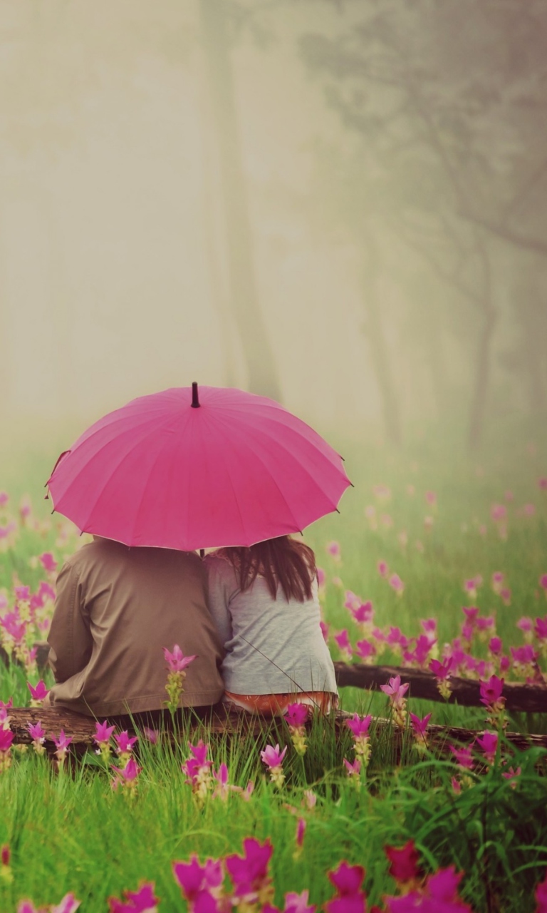 Couple Under Pink Umbrella wallpaper 768x1280