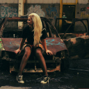 Das Blonde Girl And Old Scrap Car Wallpaper 128x128