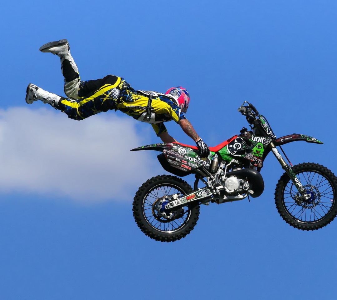 Обои Motorcyclist Ride Jump 1080x960