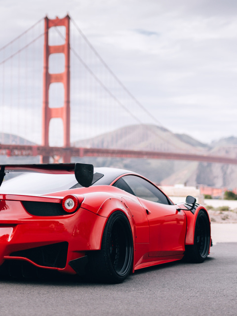 Ferrari 458 Italia near Golden Gate Bridge wallpaper 480x640