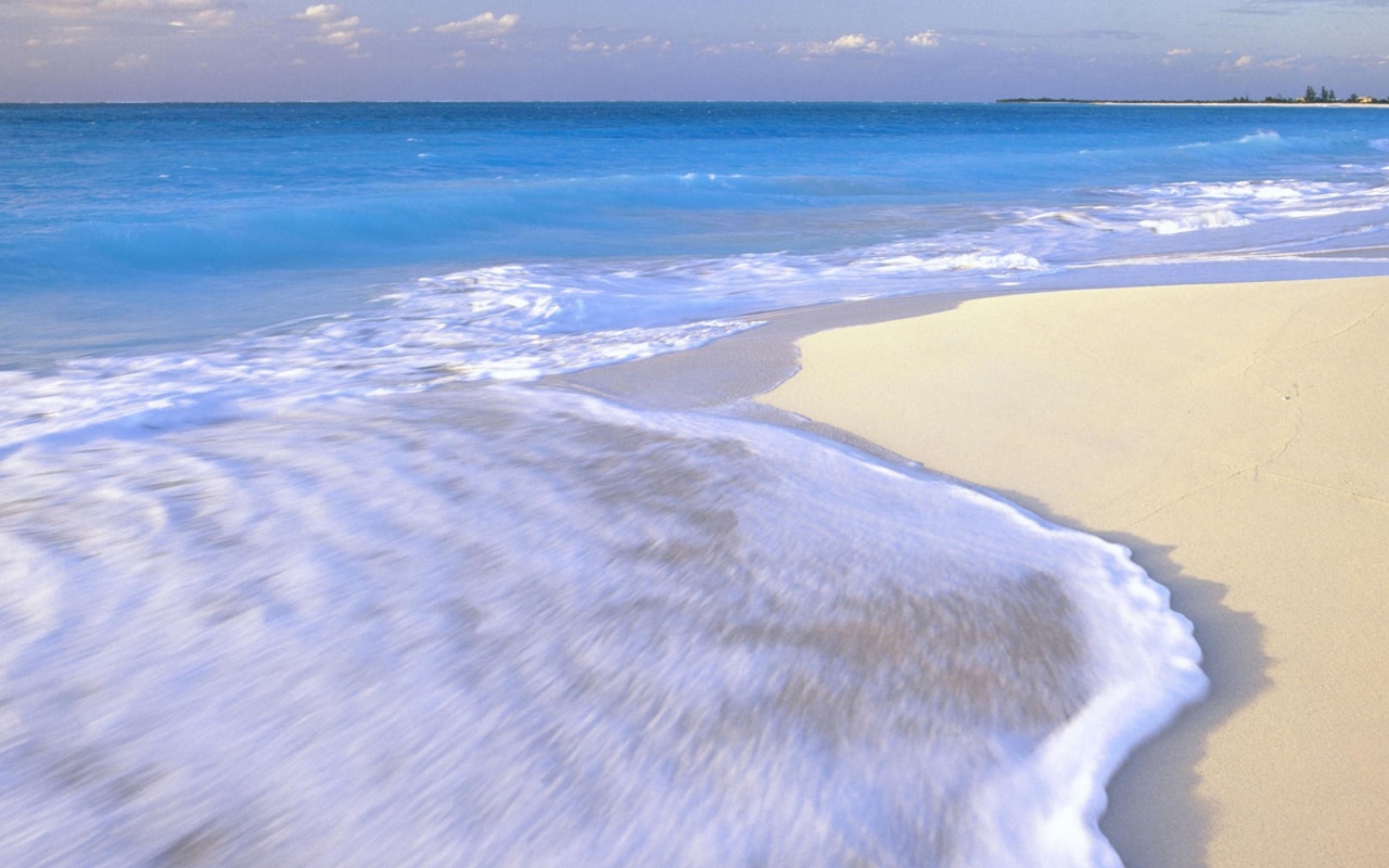 White Beach And Blue Water wallpaper 1280x800