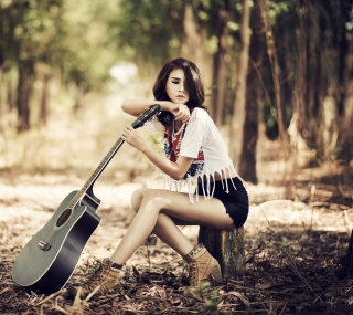 Kostenloses Pretty Brunette Model With Guitar At Meadow Wallpaper für iPad