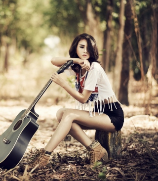 Pretty Brunette Model With Guitar At Meadow Background for HTC Titan