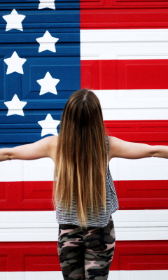 American Girl In Front Of USA Flag wallpaper 240x400