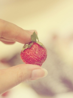 Strawberry In Her Hand wallpaper 240x320
