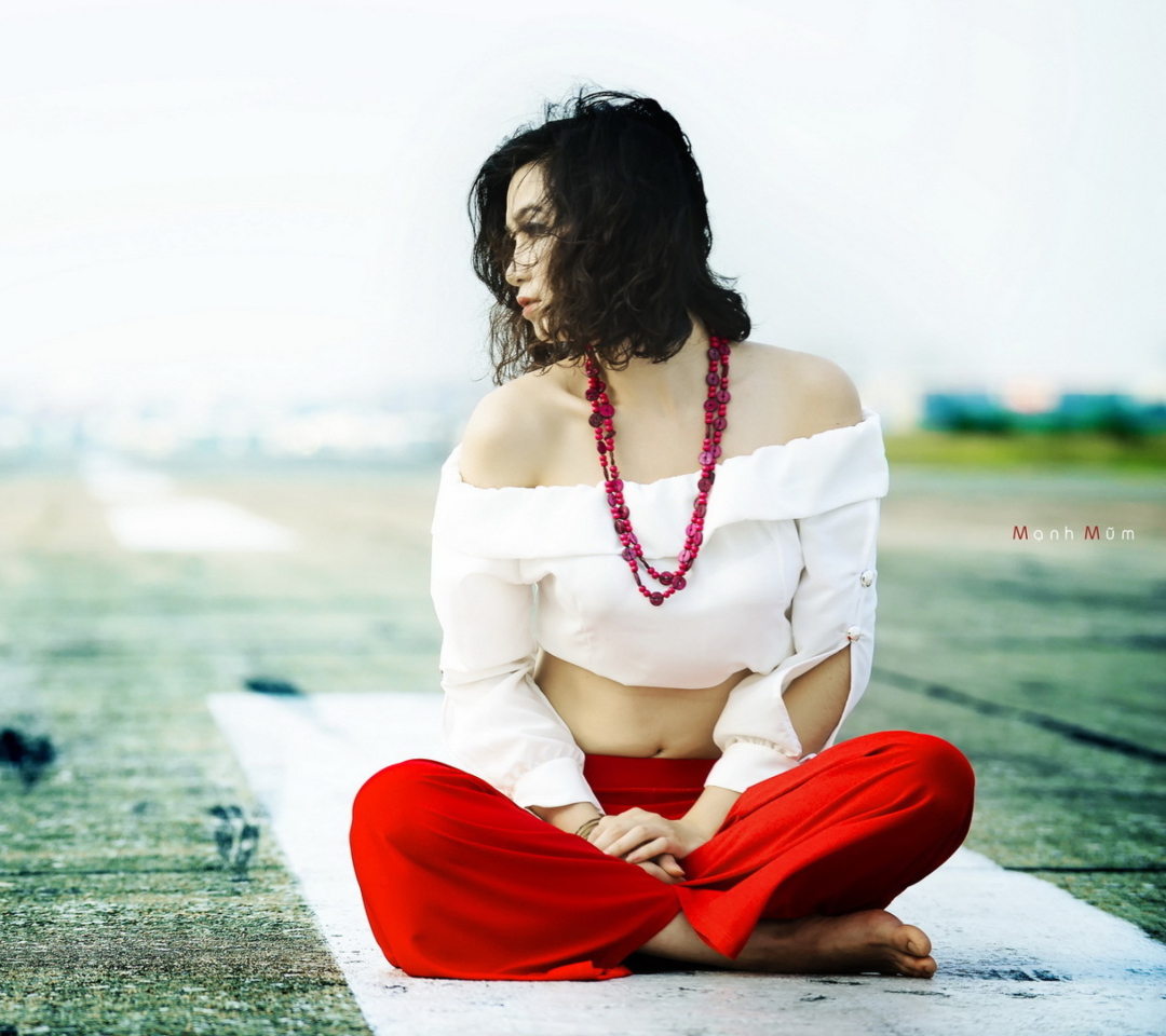 Brunette Wearing Coral Beads wallpaper 1080x960