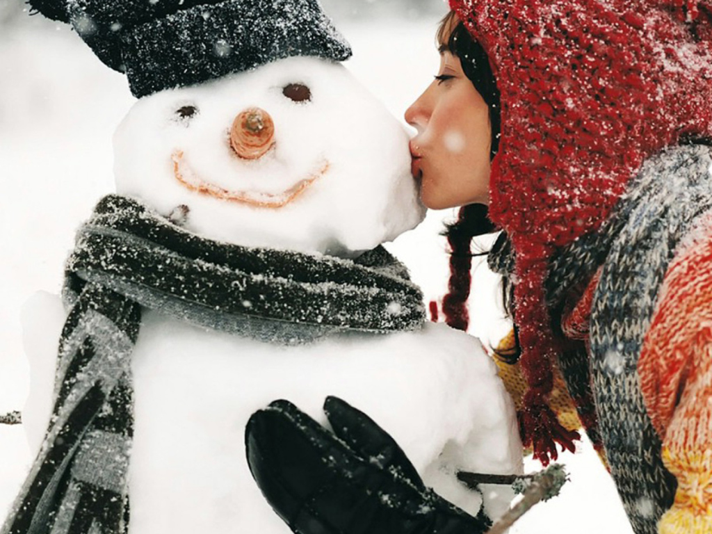 Girl Kissing The Snowman wallpaper 1024x768