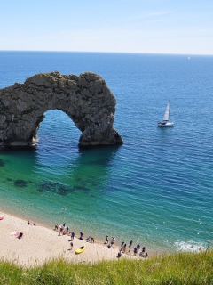 Beautiful Coast And Boat wallpaper 240x320