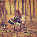 Screenshot №1 pro téma Girl Reading Old Books In Autumn Park 128x128