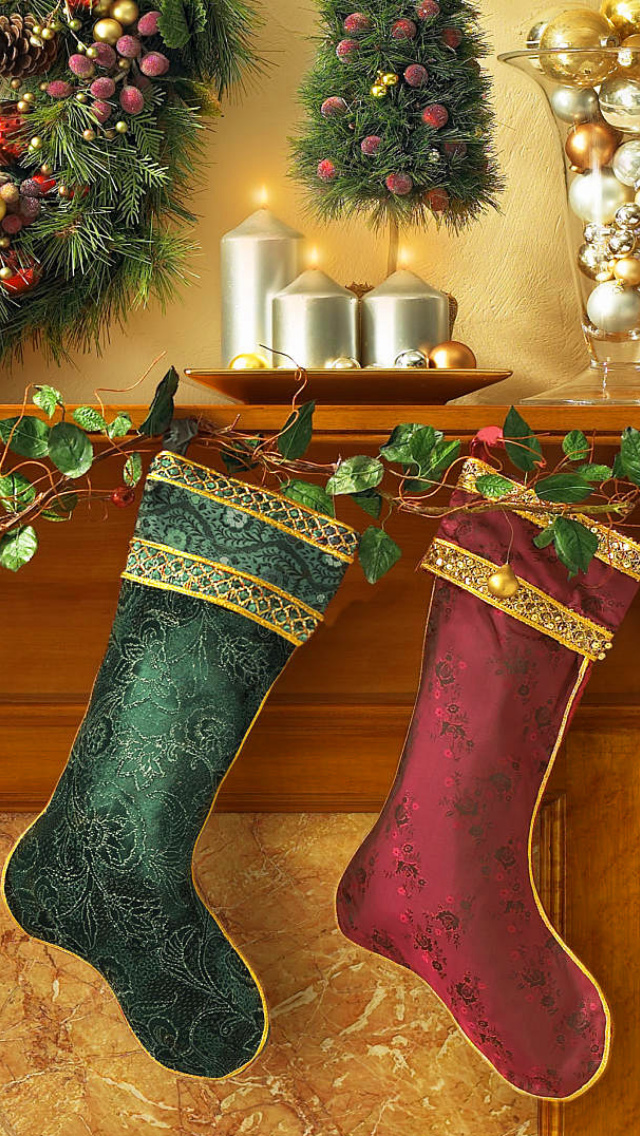 Christmas stocking on fireplace wallpaper 640x1136