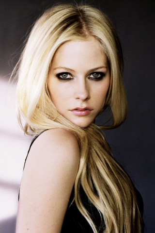 Cute Blonde Avril Lavigne wallpaper 320x480