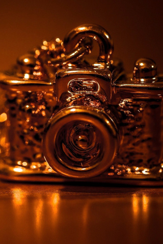 Vintage Golden Camera wallpaper 320x480