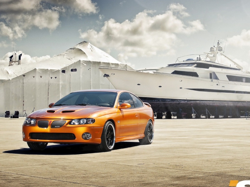 Das Orange Pontiac GTO In Port Ship Wallpaper 800x600