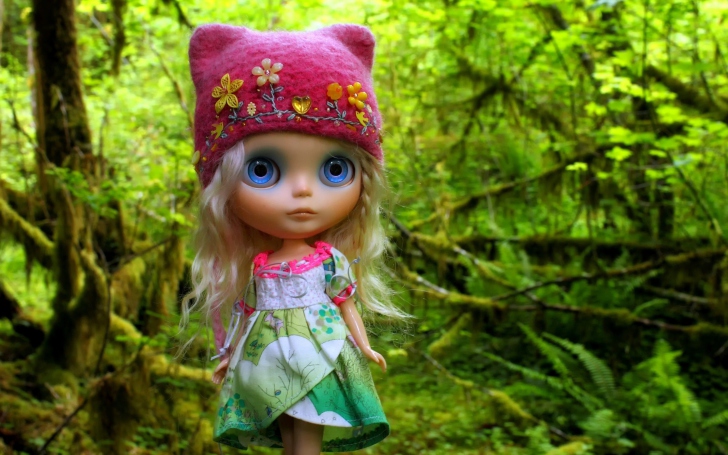 Cute Blonde Doll In Forest wallpaper