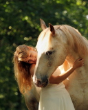 Fondo de pantalla Blonde Girl And Horse 128x160