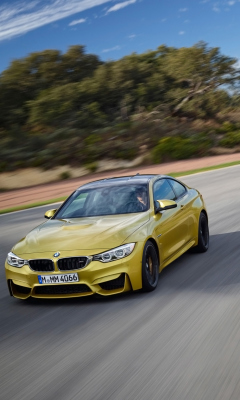 Sfondi 2014 BMW M4 Coupe In Motion 240x400