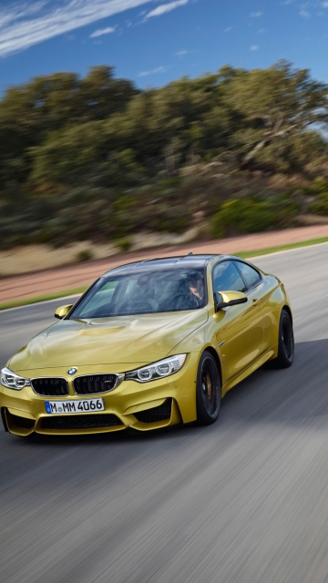 Das 2014 BMW M4 Coupe In Motion Wallpaper 360x640
