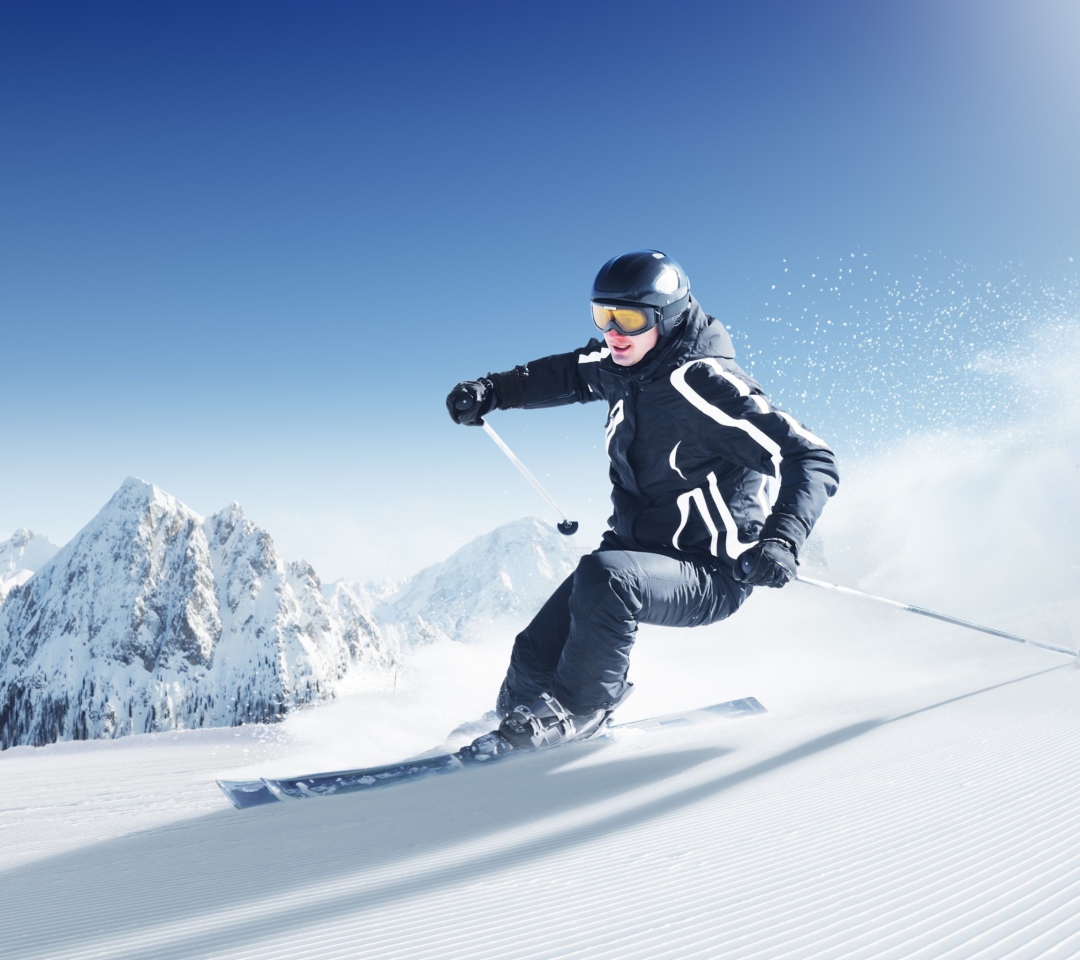 Das Skiing In Snowy Mountains Wallpaper 1080x960