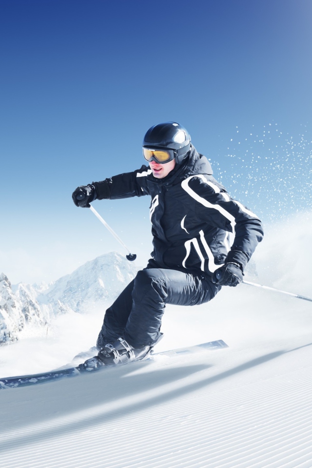Das Skiing In Snowy Mountains Wallpaper 640x960