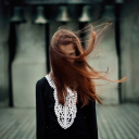 Brunette With Windy Hair wallpaper 128x128