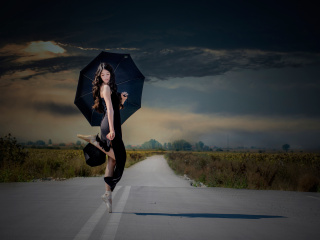 Ballerina with black umbrella wallpaper 320x240