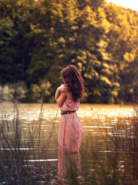 Girl In Summer Dress In River wallpaper 480x640