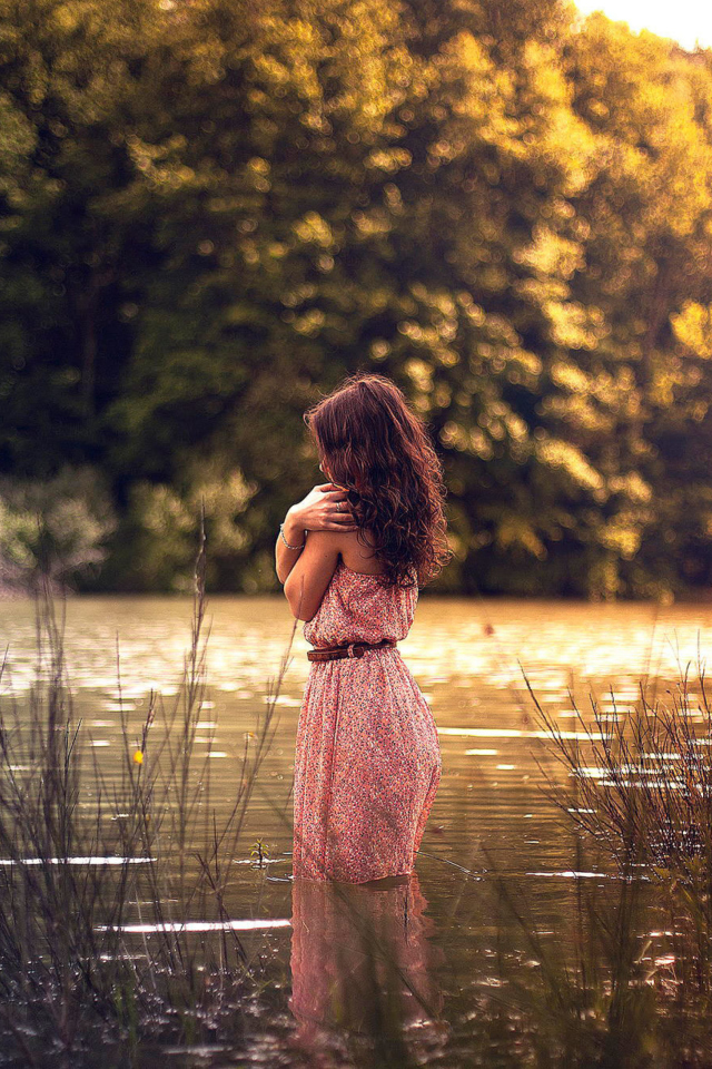 Girl In Summer Dress In River wallpaper 640x960