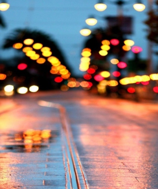 Kostenloses City Lights After Rain Wallpaper für Nokia C1-01