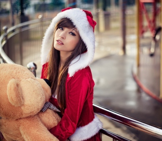 Kostenloses Santa Girl With Teddy Bear Wallpaper für iPad 3