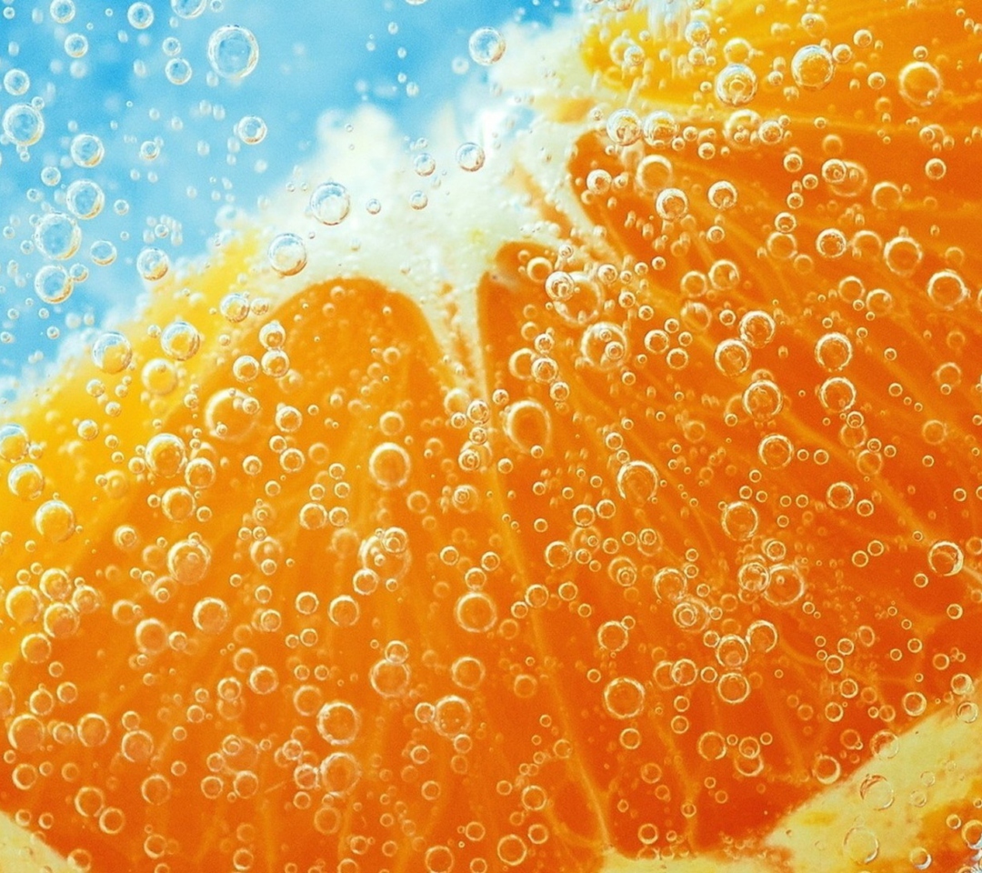 Das Refreshing Orange Drink Wallpaper 1080x960
