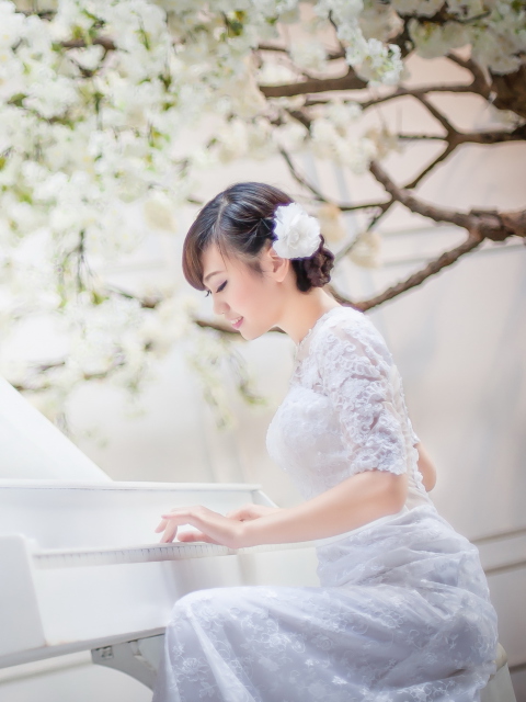 Cute Asian Girl In White Dress Playing Piano wallpaper 480x640