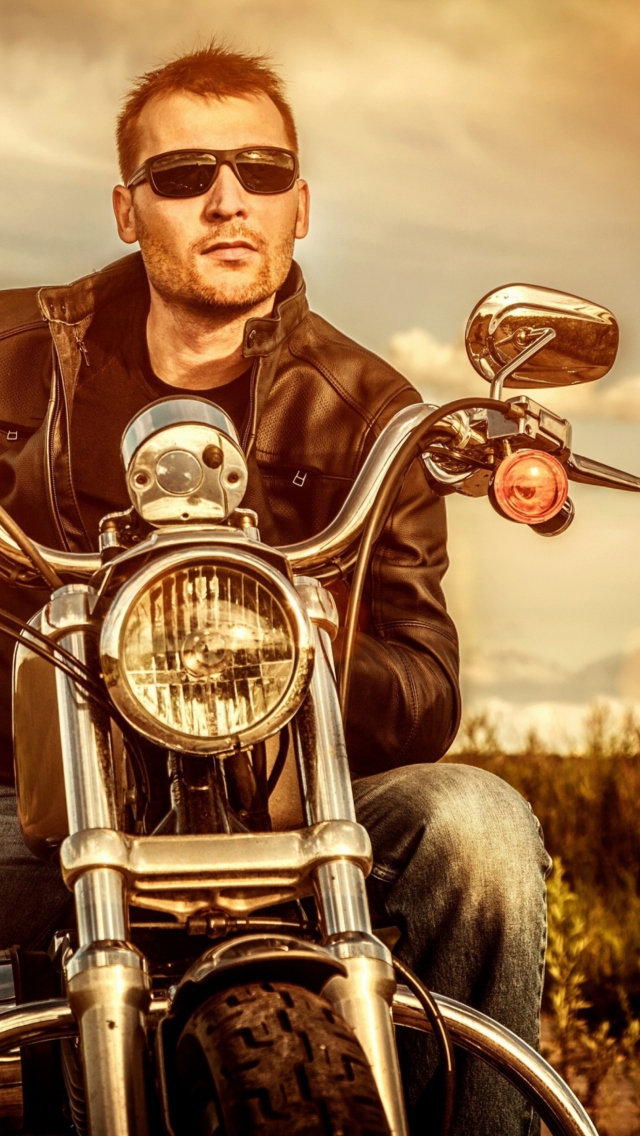 Das Motorcycle Driver Wallpaper 640x1136