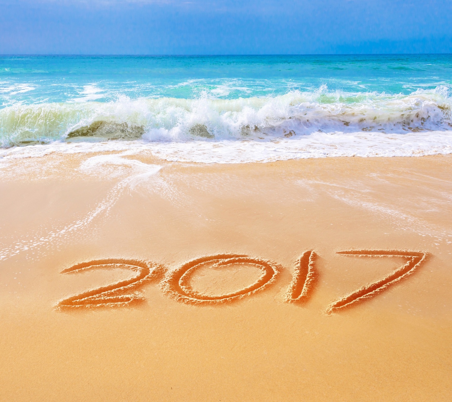 Обои Happy New Year 2017 Phrase on Beach 1440x1280