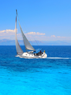 Обои White Boat In Blue Sea 240x320