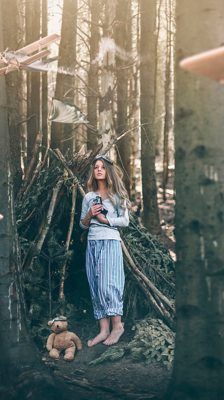 Girl And Teddy Bear In Forest By Rosie Hardy wallpaper 750x1334