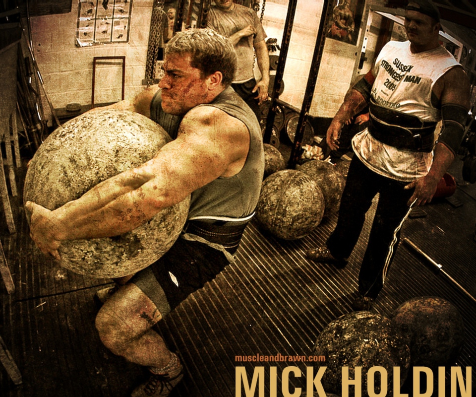 Das Mick Holding Strongman Wallpaper 960x800