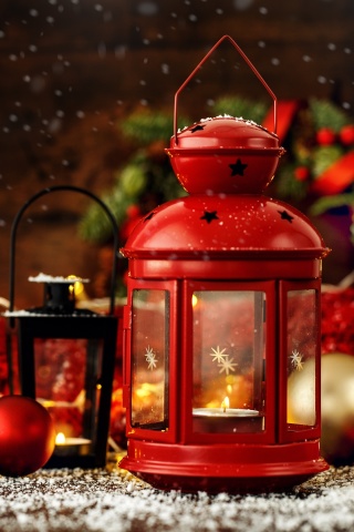 Christmas candles with holiday decor wallpaper 320x480