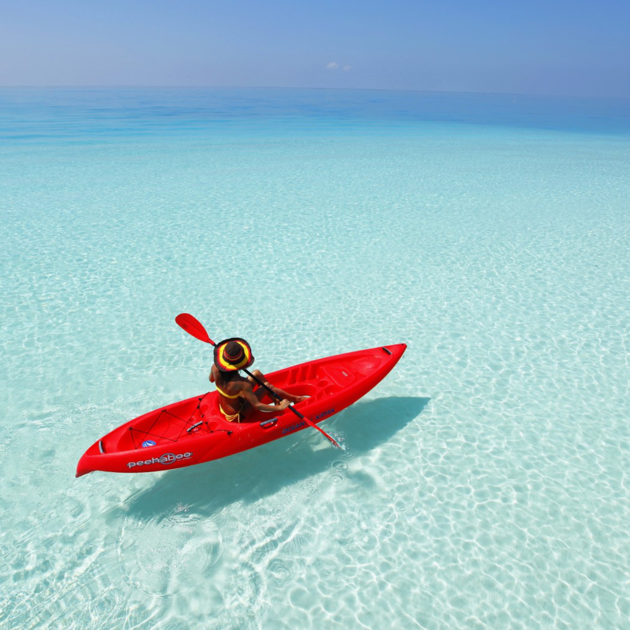 Red Kayak And Transparent Water wallpaper 2048x2048